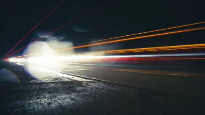A long exposure of cars driving past.